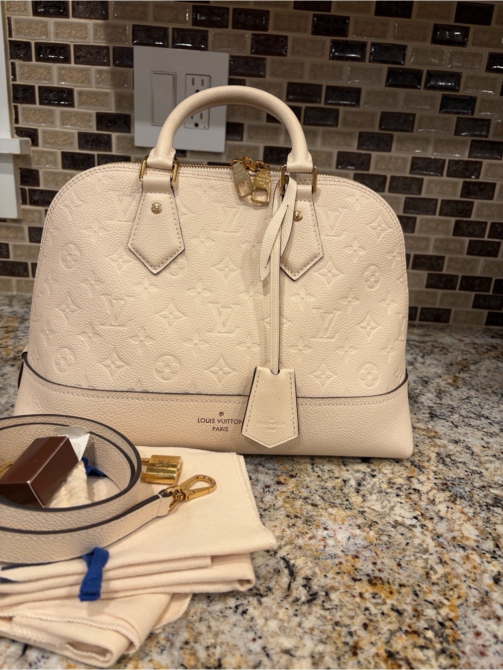 Louis Vuitton Cream Alma PM Top-Handle Satchel with Strap